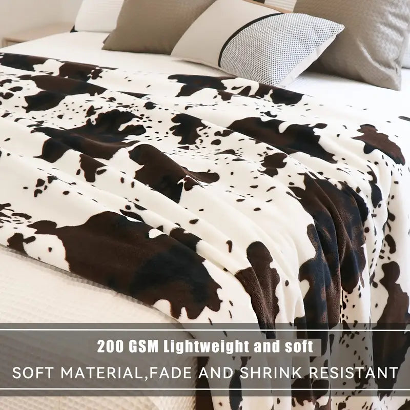 Playful Softness for Every Couch | Cow Print Fleece Throw Blanket
