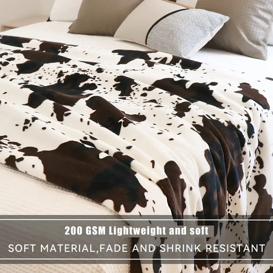 Playful Softness for Every Couch | Cow Print Fleece Throw Blanket